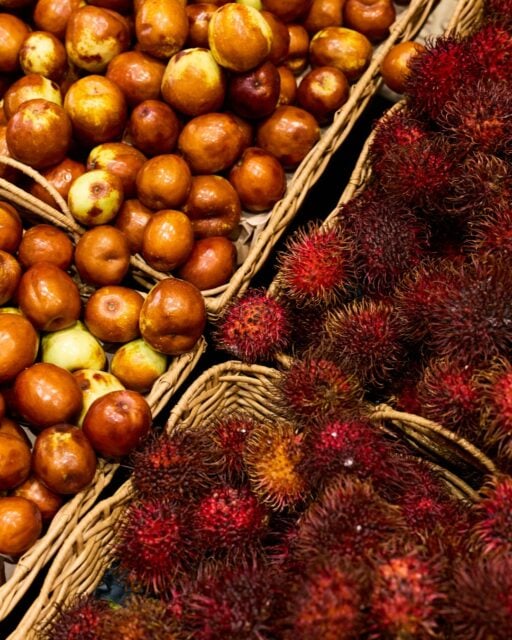 Ever peeled a rambutan? Cracked open a jujube?
She has. Many times, in many places. That's why they're here.
Rambutans – sweet, floral, with that satisfying pop when the skin gives way. Jujubes – crisp like an apple, honeyed like a date. The kind of thing you won't stumble across in your average supermarket. The kind of thing she went looking for.
Go on. Try something new.